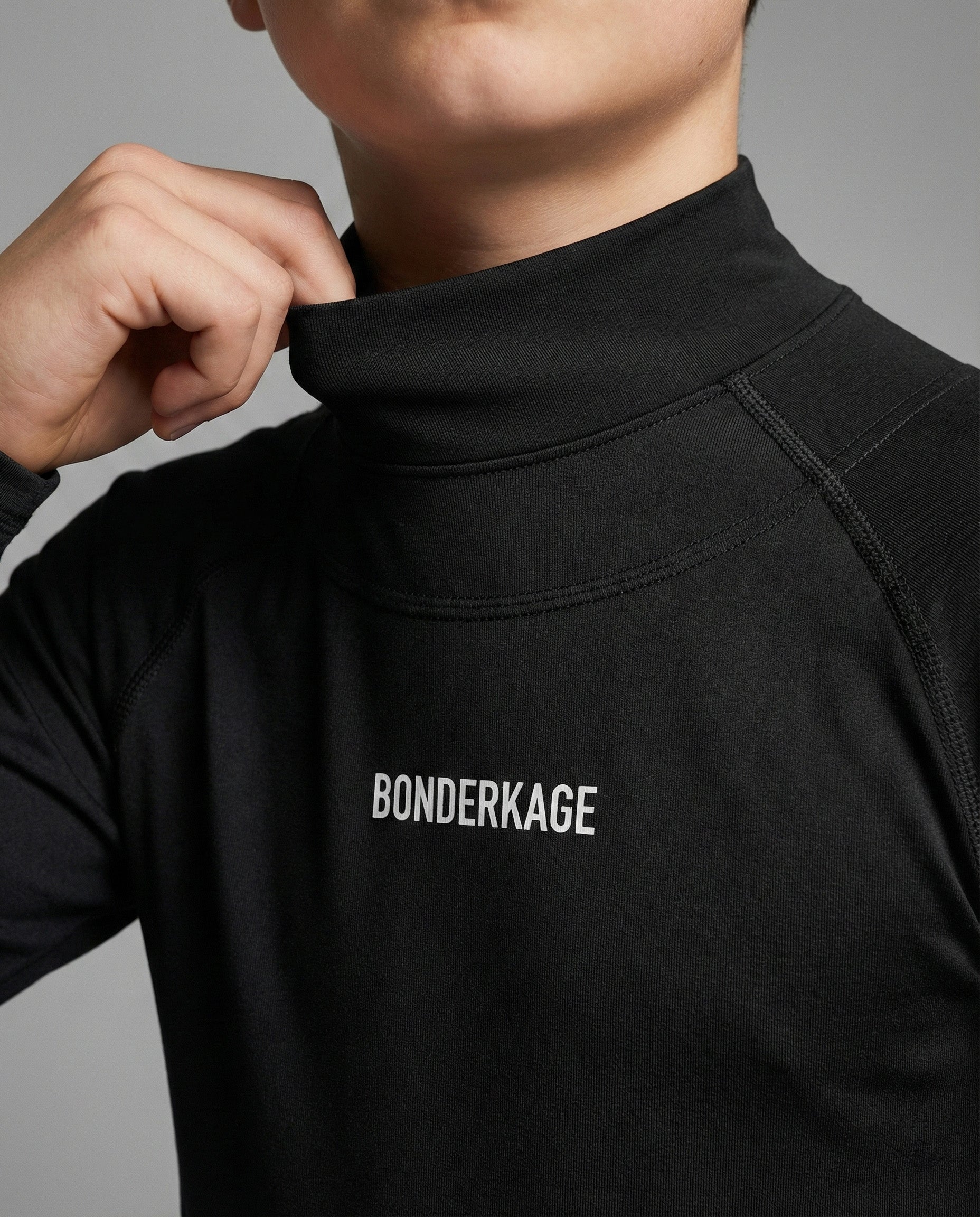 A9 COMPRESSION LONG-SLEEVE NECK GUARD TOP (JUNIOR)