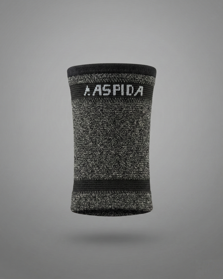 A soft, stretch compression sleeve worn directly against the skin, engineered with 360° A9 cut protection around the wrist for secure, low-profile coverage without itching or irritation.